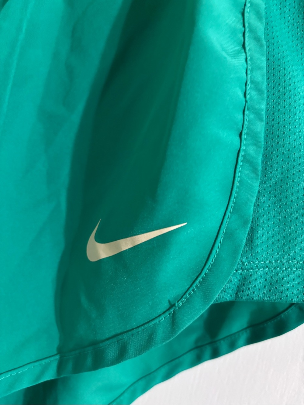 Nike Teal Running Shorts with White Swoosh